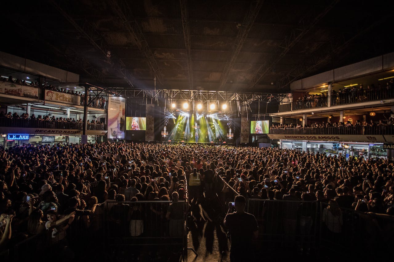 A lively indoor concert with a massive crowd in São Paulo, capturing the essence of live music and entertainment.